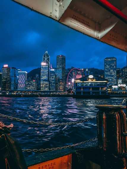 HKHKG Hong Kong person standing on boat during night time sankalp sharma.jpg