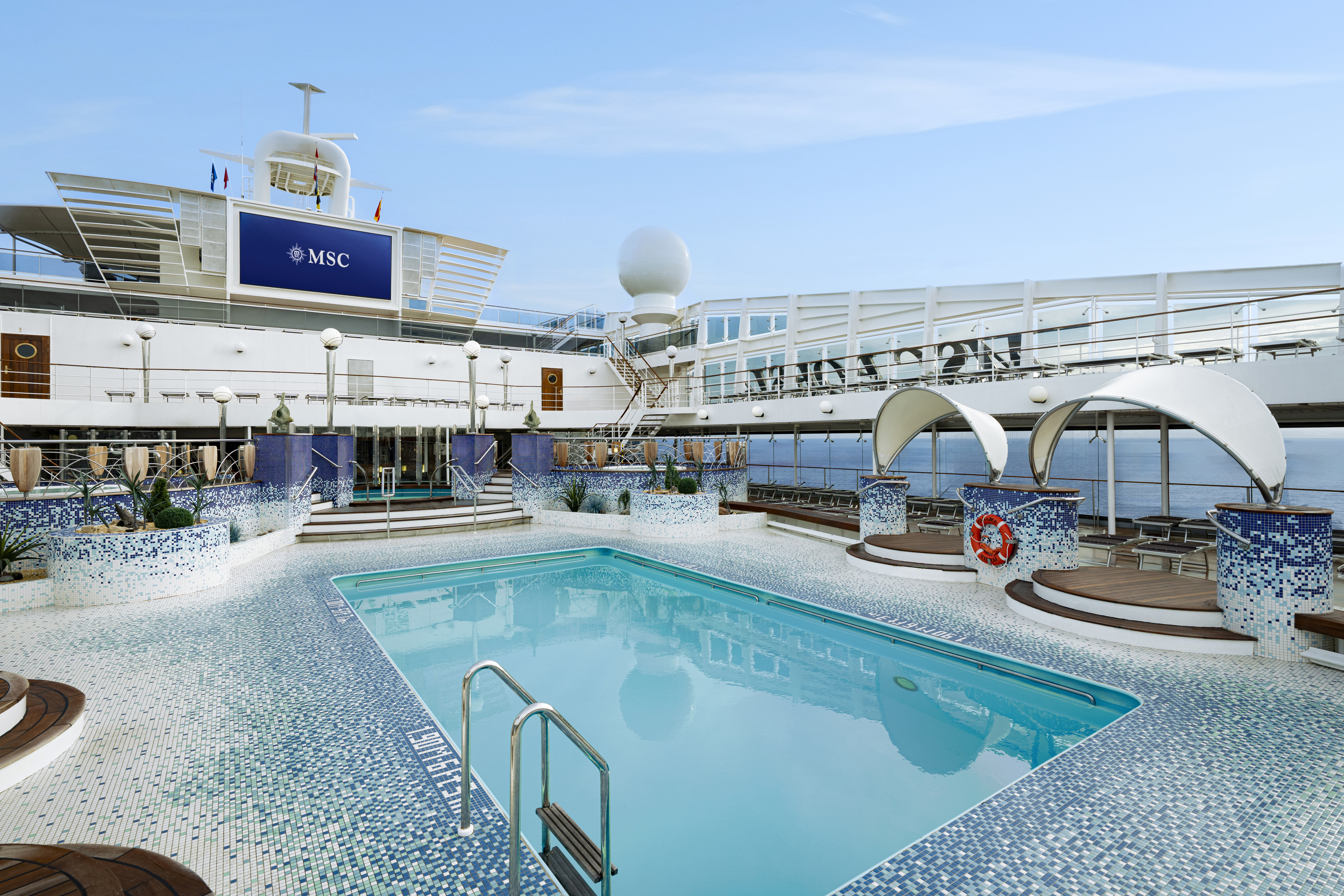 The Coral Bay Pool Area offers a swimming pool and poolside cinema, the perfect spot to relax and enjoy outdoor entertainment