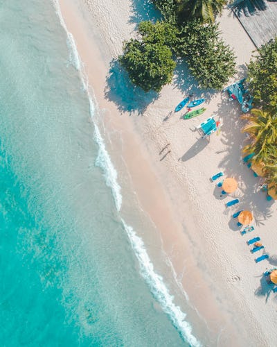 Breathtaking view of the ocean with a small house in the Caribbean